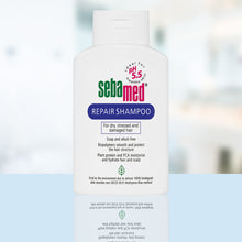 Load image into Gallery viewer, Sebamed Hair Repair Shampoo lifestyle shot
